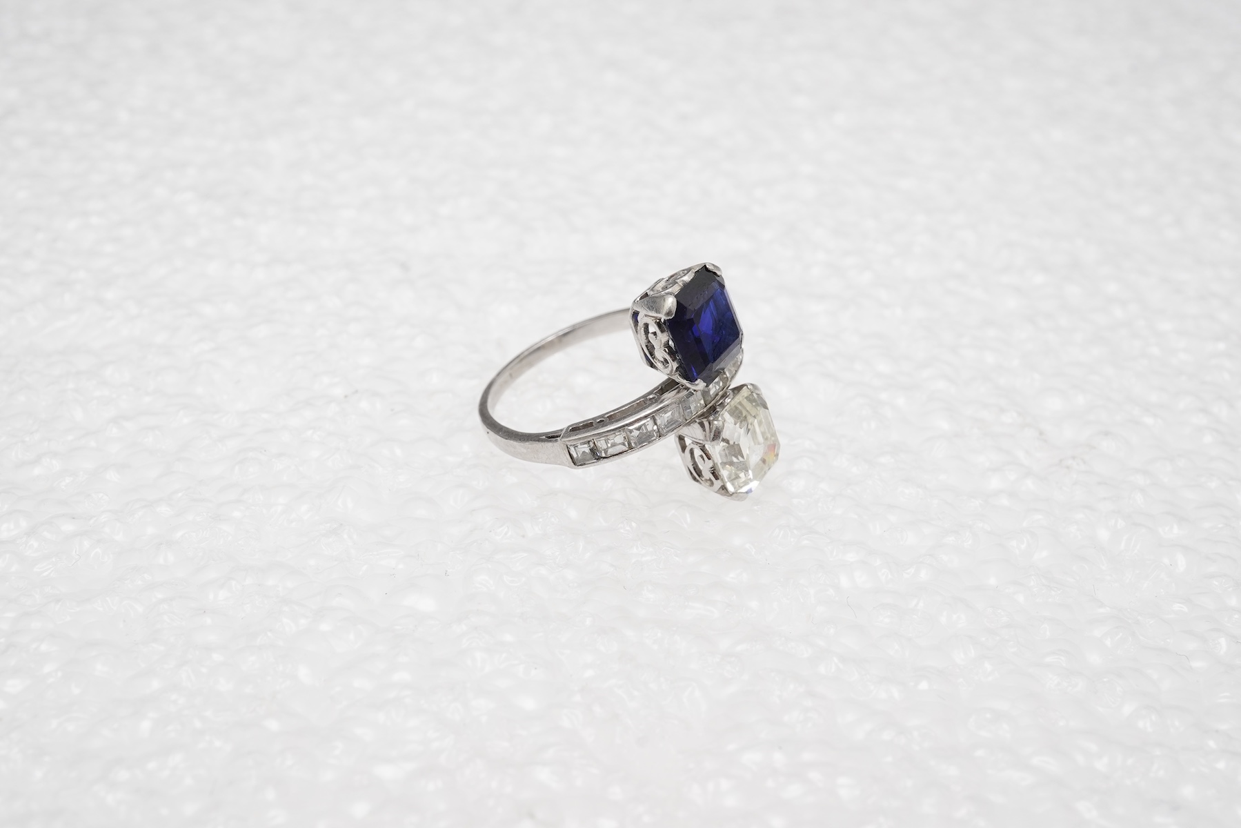 An Art Deco sapphire and diamond 'toi-et-moi' ring, 1930s
